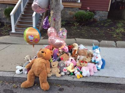 A makeshift memorial grew in front of Bella Bond’s Maxwell street home. 	Jennifer Smith photo